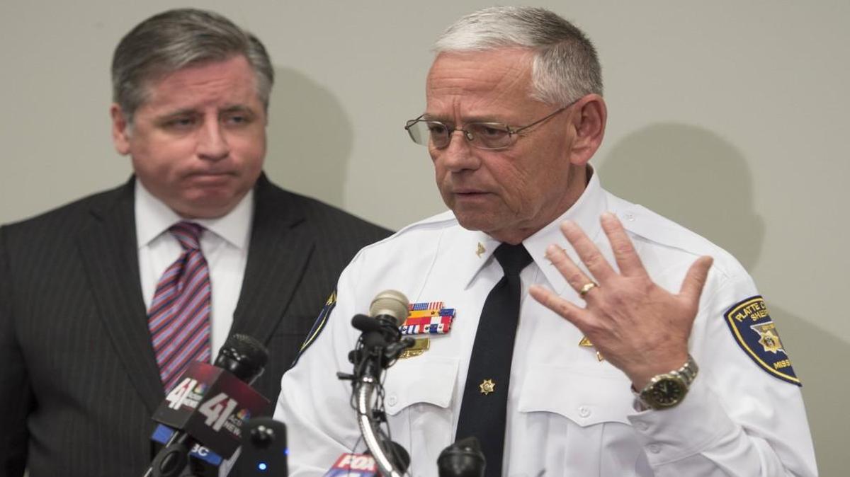 “I don’t want to take a chance on a loophole. We need to do what is right for the victims and get this done right the first time,” Platte County Sheriff Mark Owen (right) said Monday as he and County Prosecutor Eric Zahnd spoke at a news conference on the investigation into four homicides Friday near Edgerton, Mo. Grayden Lane Denham, 24, a person of interest in the case, was arrested Sunday in Arizona and charged with auto theft in Platte County.