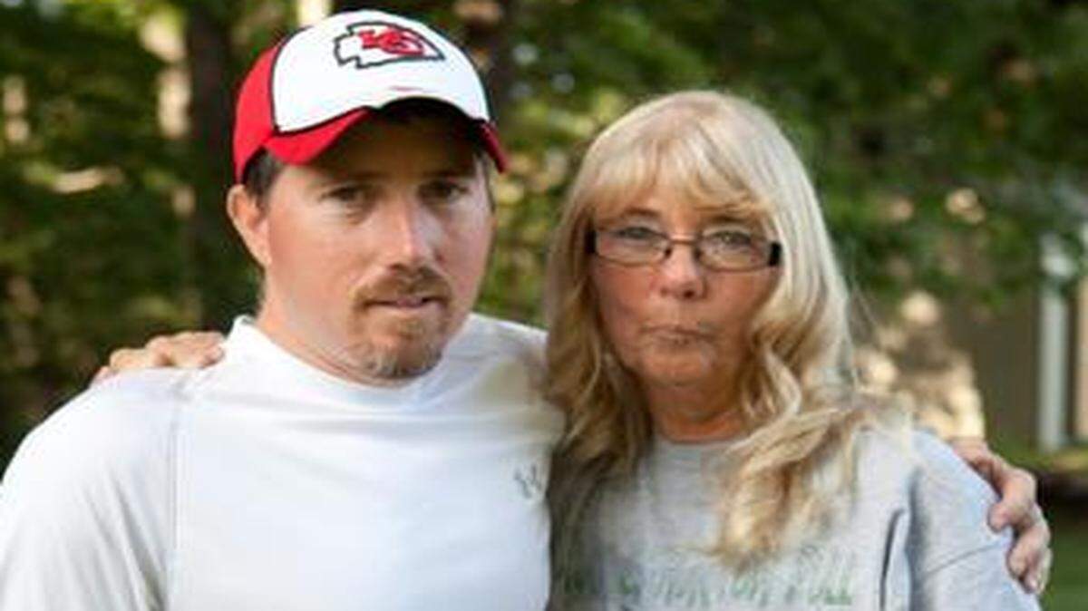 
Mark Woodworth, who spent more than 17 years in prison, filed a federal civil rights lawsuit Monday, alleging a wide-ranging conspiracy to frame him for the 1990 murder of his neighbor Cathy Robertson in her home near Chillicothe, Mo. Woodworth is pictured in July with his mother, Jackie.
