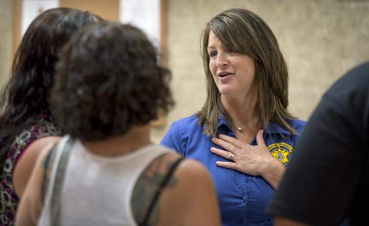 Kim Case has been an advocate for victims and survivors for years. In this file photo, she met with a victim and spoke to the family about the case at the Holt County Courthouse in Oregon, Mo.