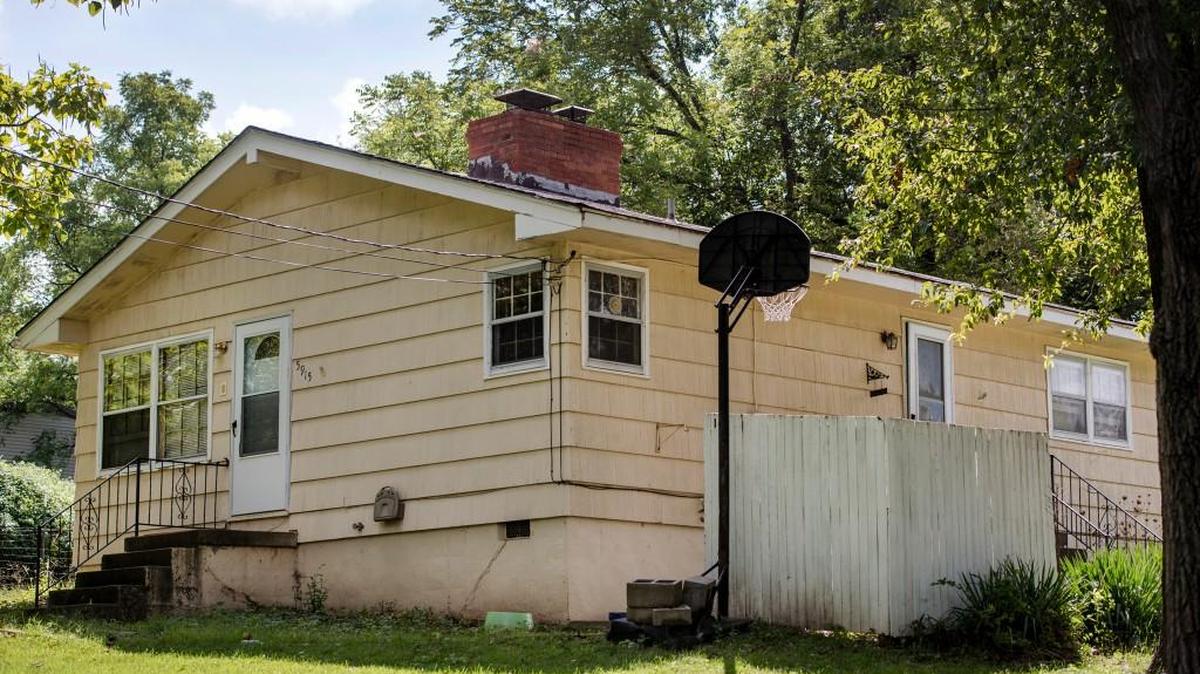 
Three people were found dead Tuesday night in this house in the 5900 block of East 84th Street, just west of Interstate 435.
