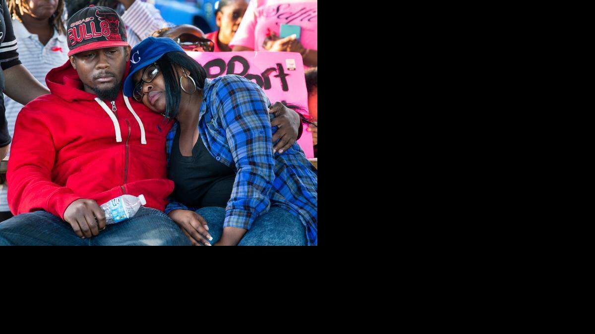 
At Sunday’s vigil at Sycamore Park for Angel Hooper, her parents, Booker Hooper and Charity Guinn, listened to speeches. Guinn said she was comforted by the community’s support.

 
