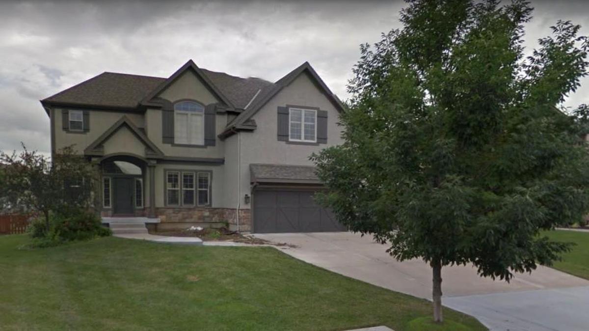 Officers found Philip and Amy Mabion suffering gunshot wounds when they were called Monday afternoon to this residence in the 24200 block of West 109th Terrace in Olathe.