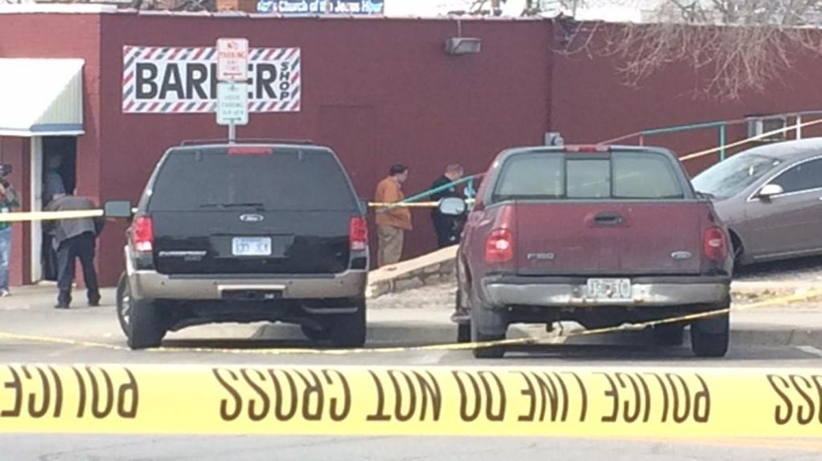 Detectives examined the scene of a fatal shooting outside a Kansas City, Kan., barbershop in the 1600 block of Minnesota Avenue on Friday afternoon.