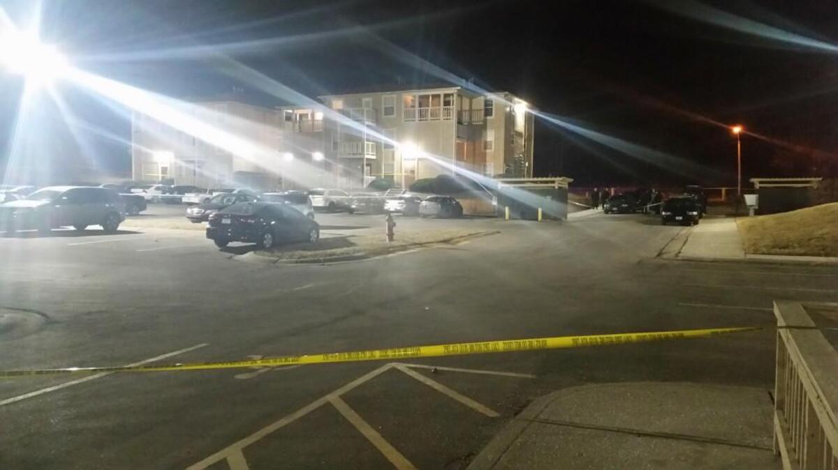 Investigators were looking for a black or blue four-door vehicle in connection with a quintuple shooting that left a man and two women dead Thursday at an apartment complex in Kansas City.