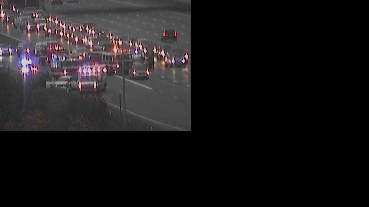 
Traffic is backed up at the scene of a fatal accident on the ramp from southbound Interstate 435 to eastbound Interstate 70 near the Truman Sports Complex.
