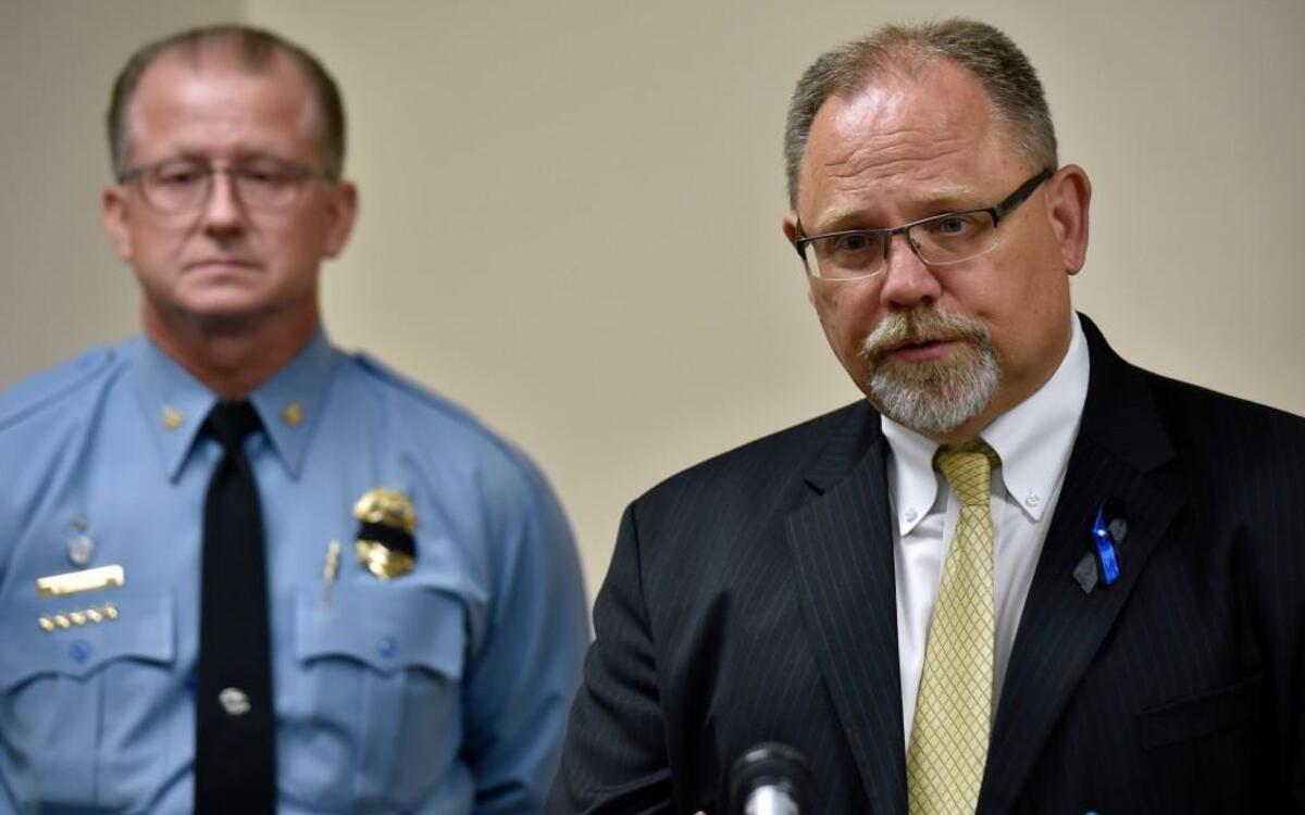At a news conference Wednesday morning, Wyandotte County District Attorney Jerome Gorman (right) and Kansas City, Kan., Police Chief Terry Zeigler announced charges against Curtis Ayers, who is accused of capital murder in the fatal shooting of Brad Lancaster, a Kansas City, Kan., police detective.