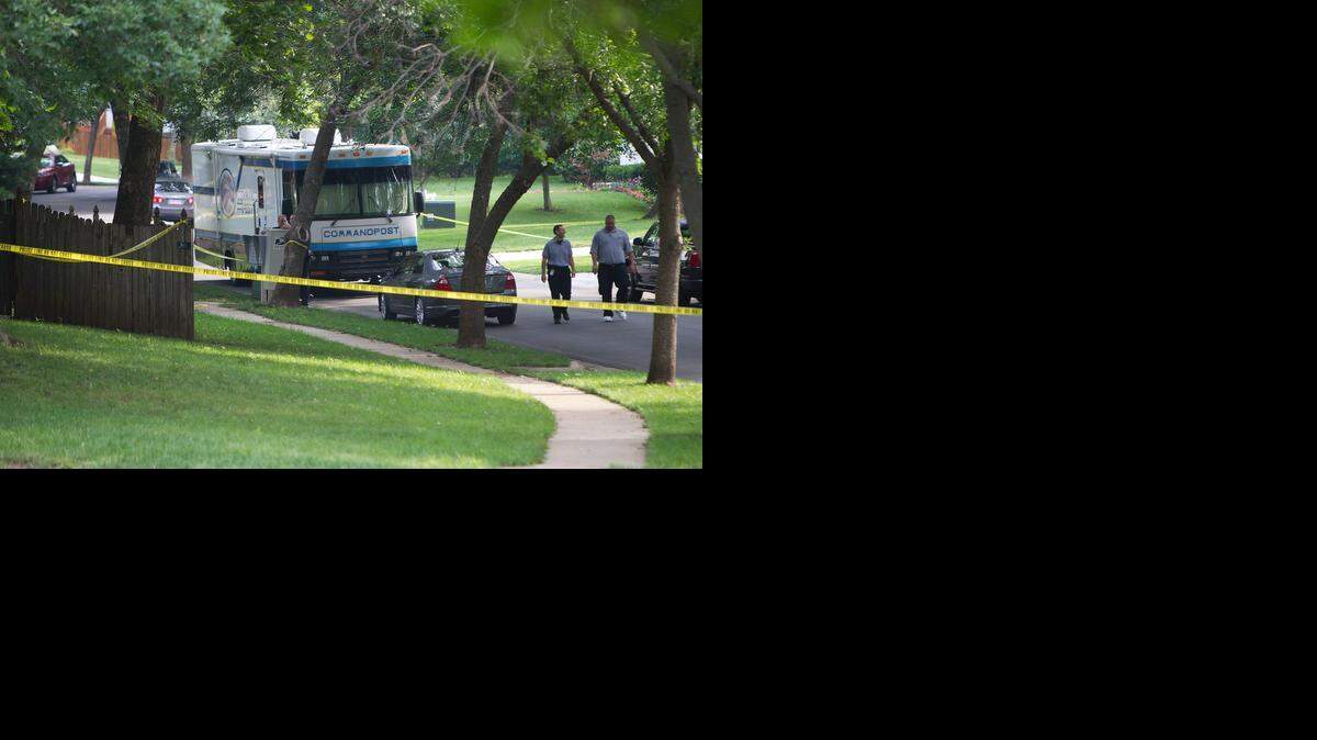 
On Thursday, authorities investigated a home in the 8500 block of Hallet Street in Lenexa, where two people were shot to death and one was injured late Wednesday.
