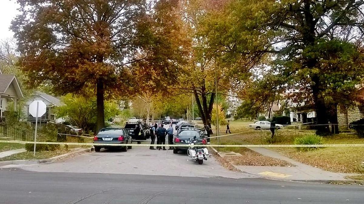 Kansas City police officers taped off an area in the 7400 block of Lydia Avenue on Wednesday morning after a man in his 20s was fatally shot inside a home.