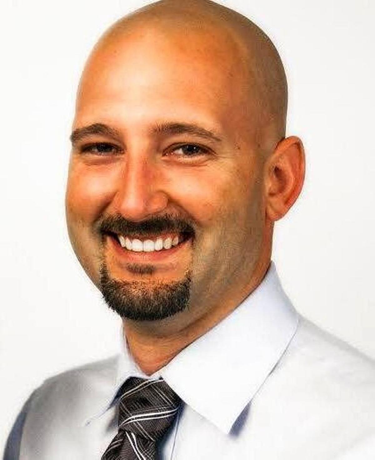 Clinton Police Officer Gary Michael, 37, was fatally shot during a traffic stop Sunday night. Authorities are looking for his killer. Ian McCarthy, 39, of Clinton, has been named a suspect.