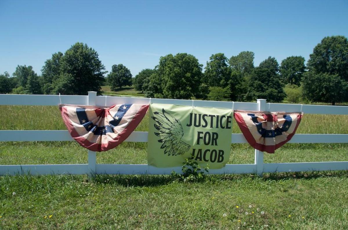 Signs like this one express support for the defendant in multiple alleged sex crimes. Jacob Ewing faces his second trial Monday in Holton, Kan.