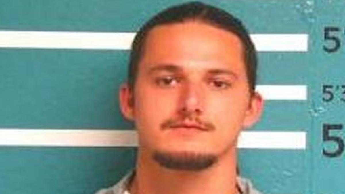 Michael J. Wilkins was charged with drug trafficking Thursday, a day after officers chased him and ended up in a fatal shootout with another man in Kansas City.