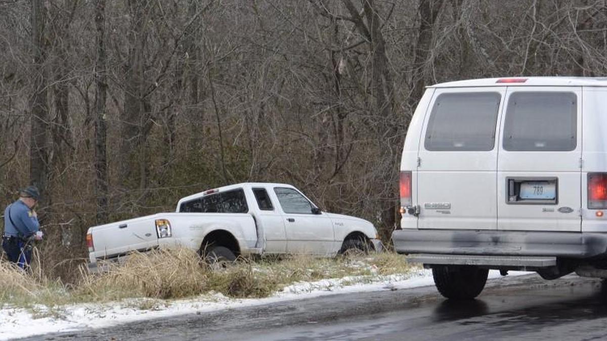 Law enforcement investigate the scene after a high-speed chase ends in south Kansas City.