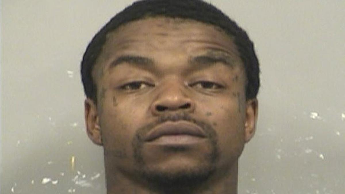 Robert Townsend is accused of shooting several people in a minivan Monday evening, killing two.