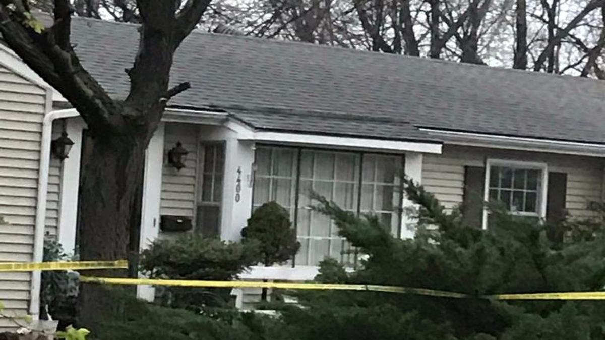 Yellow crime tape surrounded a house Sunday in the 4400 block of Norwood Avenue on Kansas City’s East Side. Police Chief Darryl Forté said detectives were waiting for a warrant.