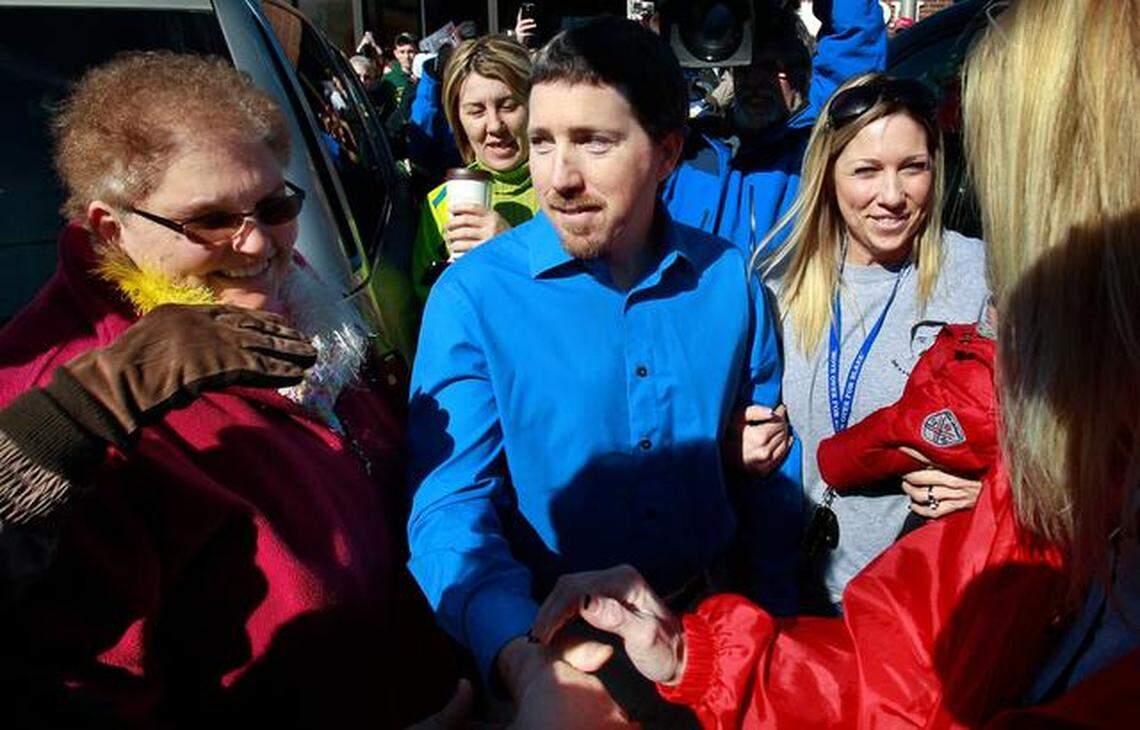 Supporters celebrated when Mark Woodworth was released from prison in February 2013 (above). They had reason to cheer again Tuesday after a special prosecutor opted not to pursue a third trial. 