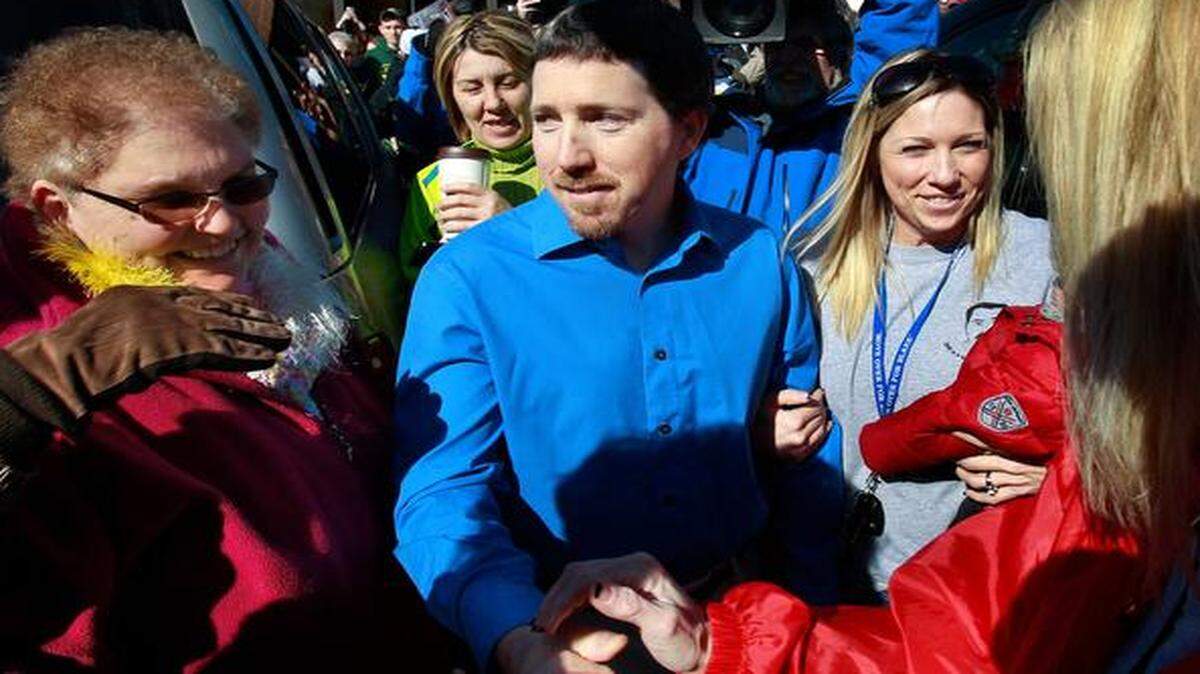 
Supporters celebrated when Mark Woodworth was released from prison in February 2013 (above). They had reason to cheer again Tuesday after a special prosecutor opted not to pursue a third trial. 
