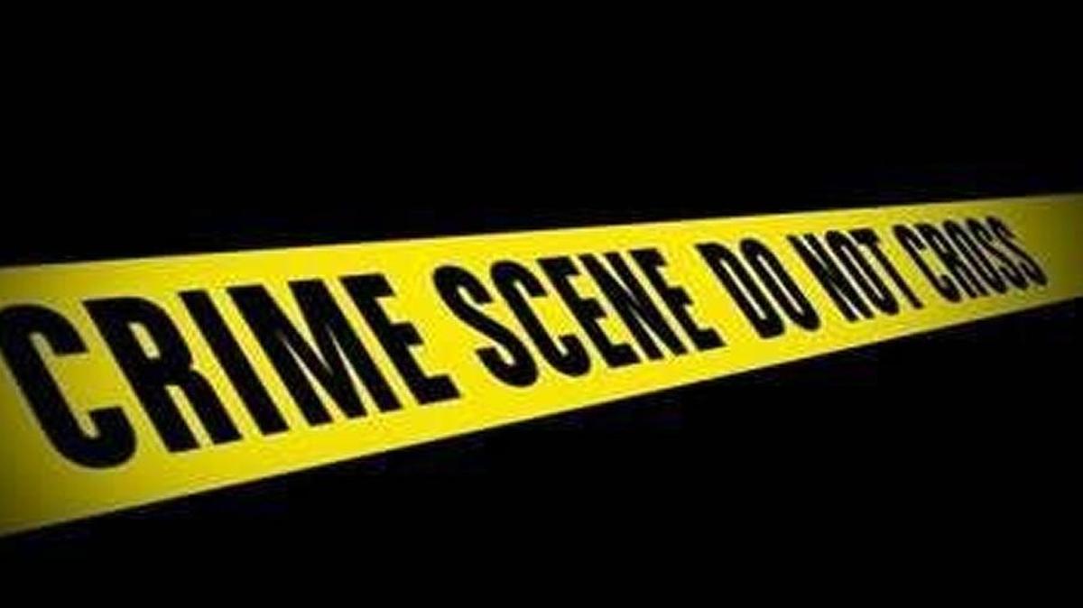 A Kansas City woman walking early Sunday near 27th Street and Garfield Avenue was grazed by a bullet when she got caught in a crossfire.
