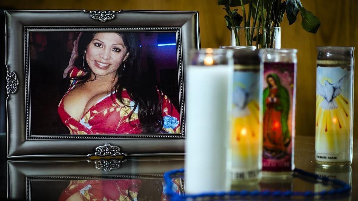 
Pictures of Tamara Dominquez were displayed with flowers and candles Tuesday in the Kansas City home she shared with her boyfriend. Dominquez. 36, was killed Saturday after being struck several times by a vehicle.
