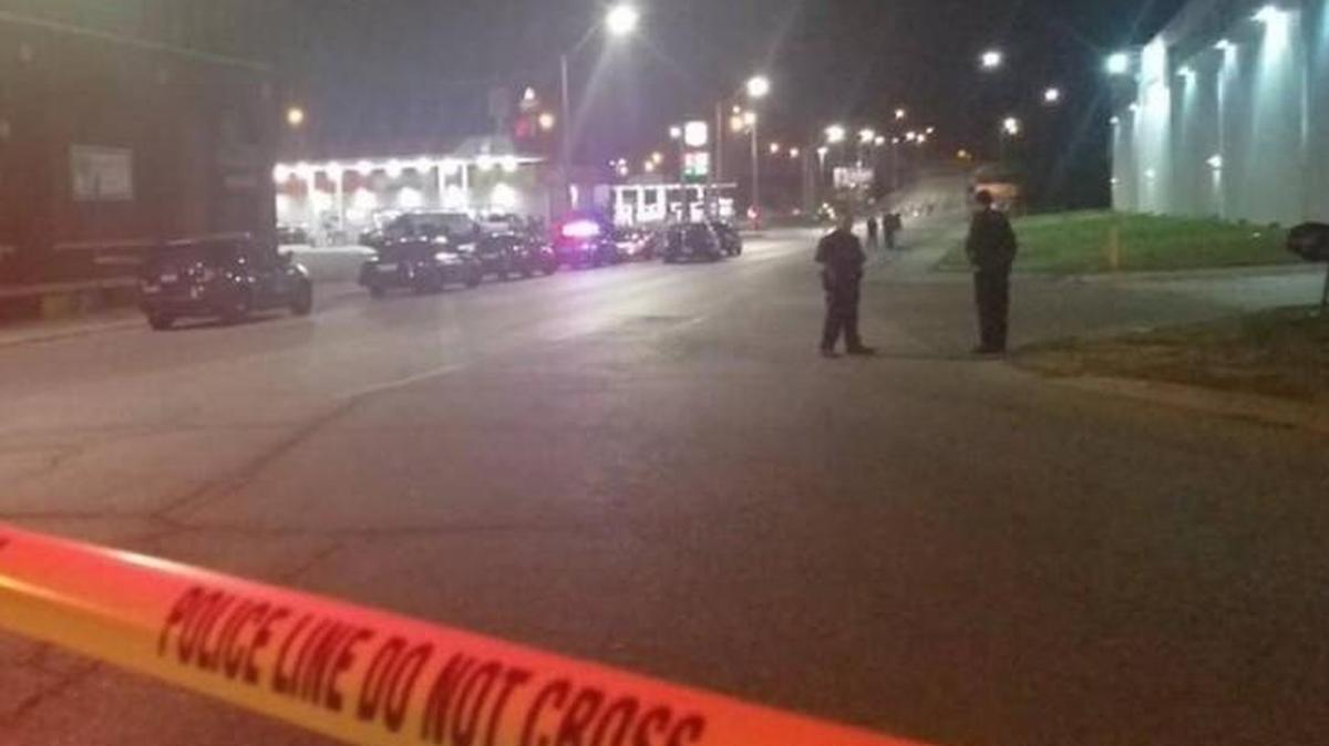 Police say a man used a cane with a knife at the end of it to fatally stab one person and injure another Wednesday in the West Bottoms.