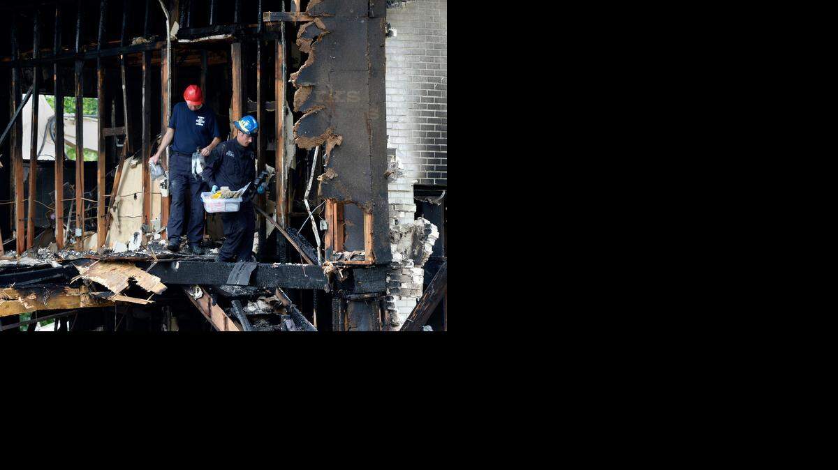 Investigators on Friday examined a Kansas City home that was heavily damaged in an explosion Wednesday.