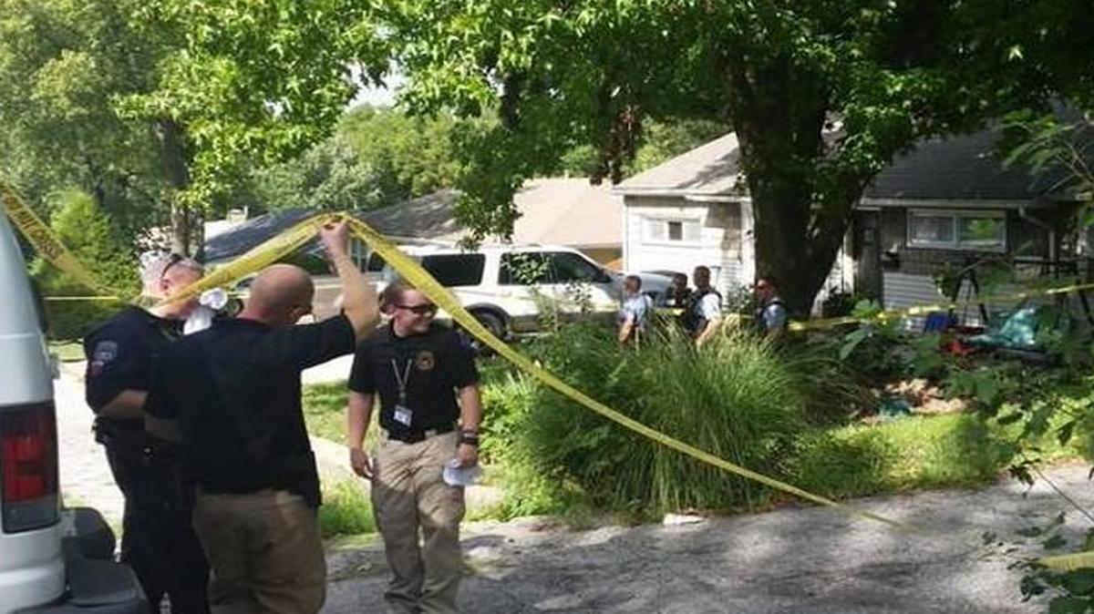Kansas City, Kan., police CSI officers awaited the approval of a warrant Tuesday to search the premises where a teen discovered the bodies of her mother and stepfather. Police identified the victim in the murder-suicide as 45-year-old Jennifer Combs.