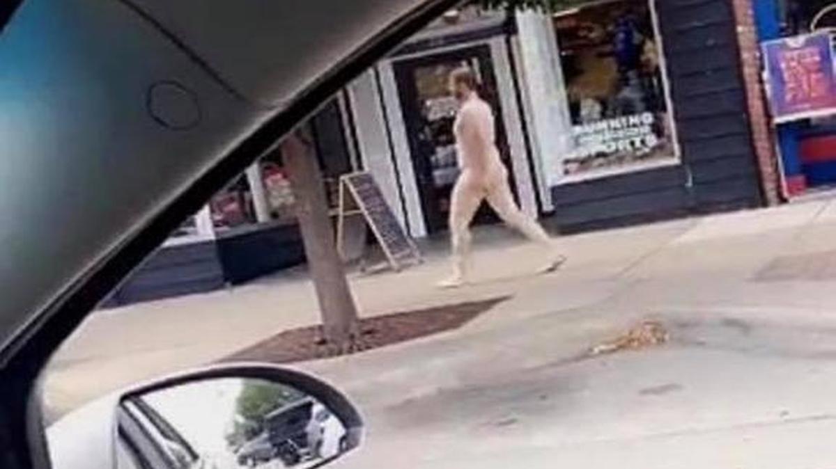 A naked man was spotted walking down Massachusetts Street in downtown Lawrence on Sunday afternoon. He was cited for indecent exposure and taken into police custody.