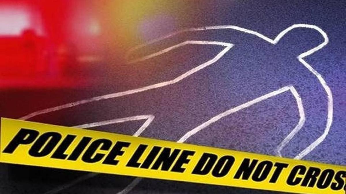 Police were trying to determine the cause of death of a man after the discovery of a body in a wooded area Wednesday afternoon in south Kansas City.