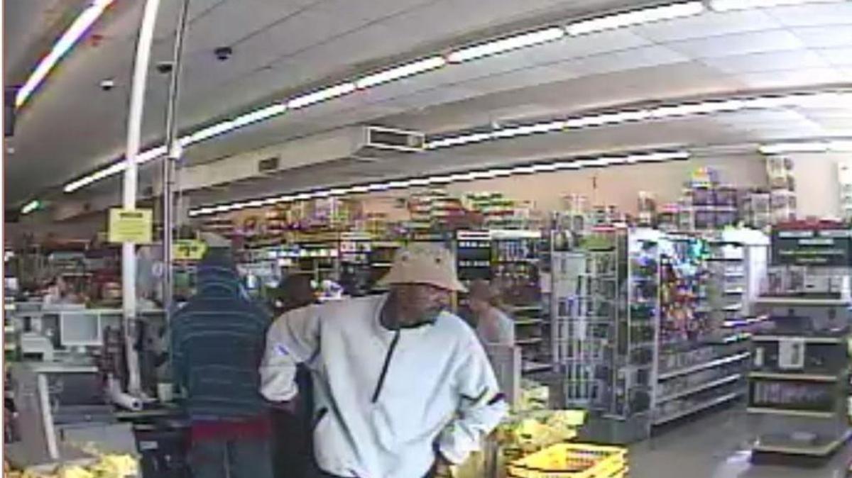 
Surveillance camera images from the robbery of a Dollar General store on Tuesday were released by Kansas City police. Two men were sought in a string of three robberies. 
