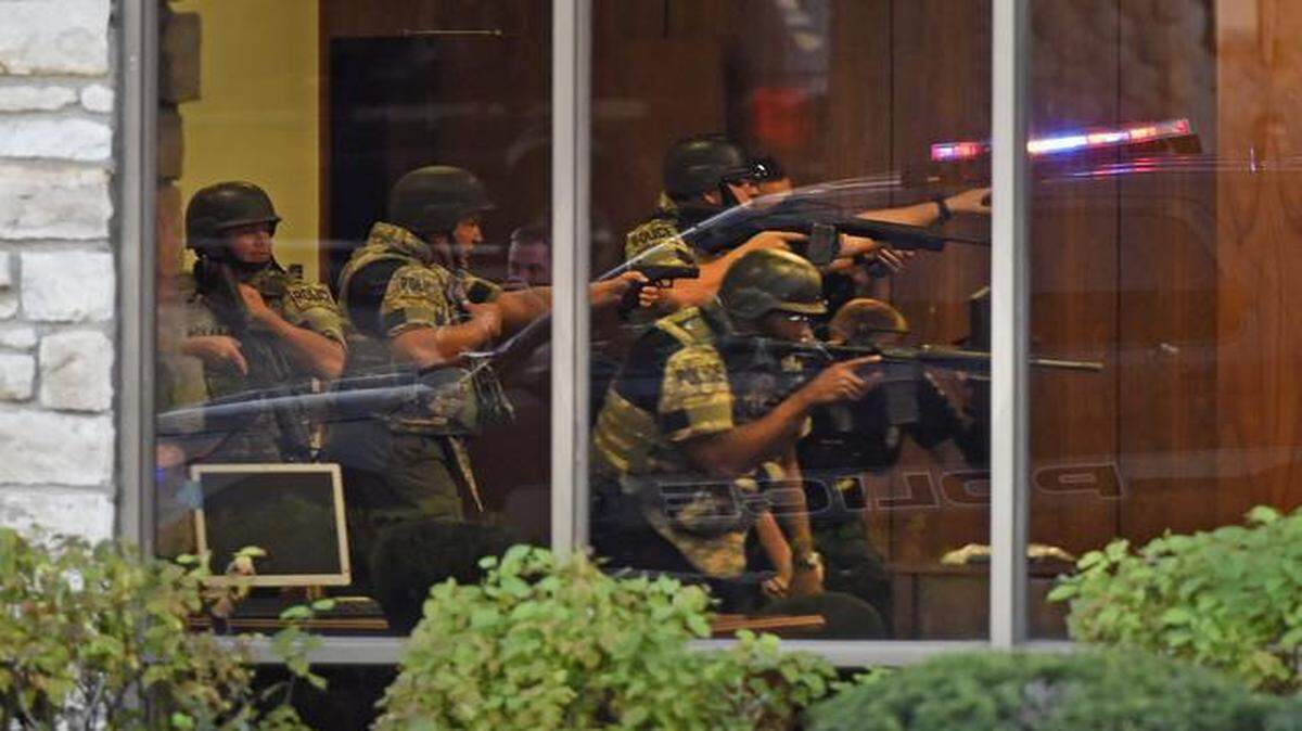 
Police tactical units responded to a bank robbery attempt last October in Overland Park. The FBI boasts a 54 percent solution rate in bank robberies. 
