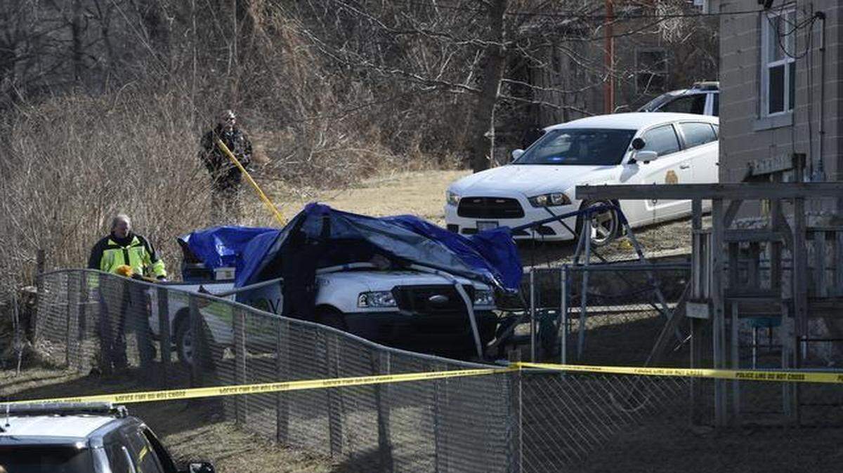 
Law enforcement officers chasing a pickup truck that had been carjacked shot and killed the driver after he crashed into a fence and “presented a gun” Friday morning at Ruby Avenue and 12th Street in Kansas City, Kan. Officers covered the body with a blue tarp while they investigated.
