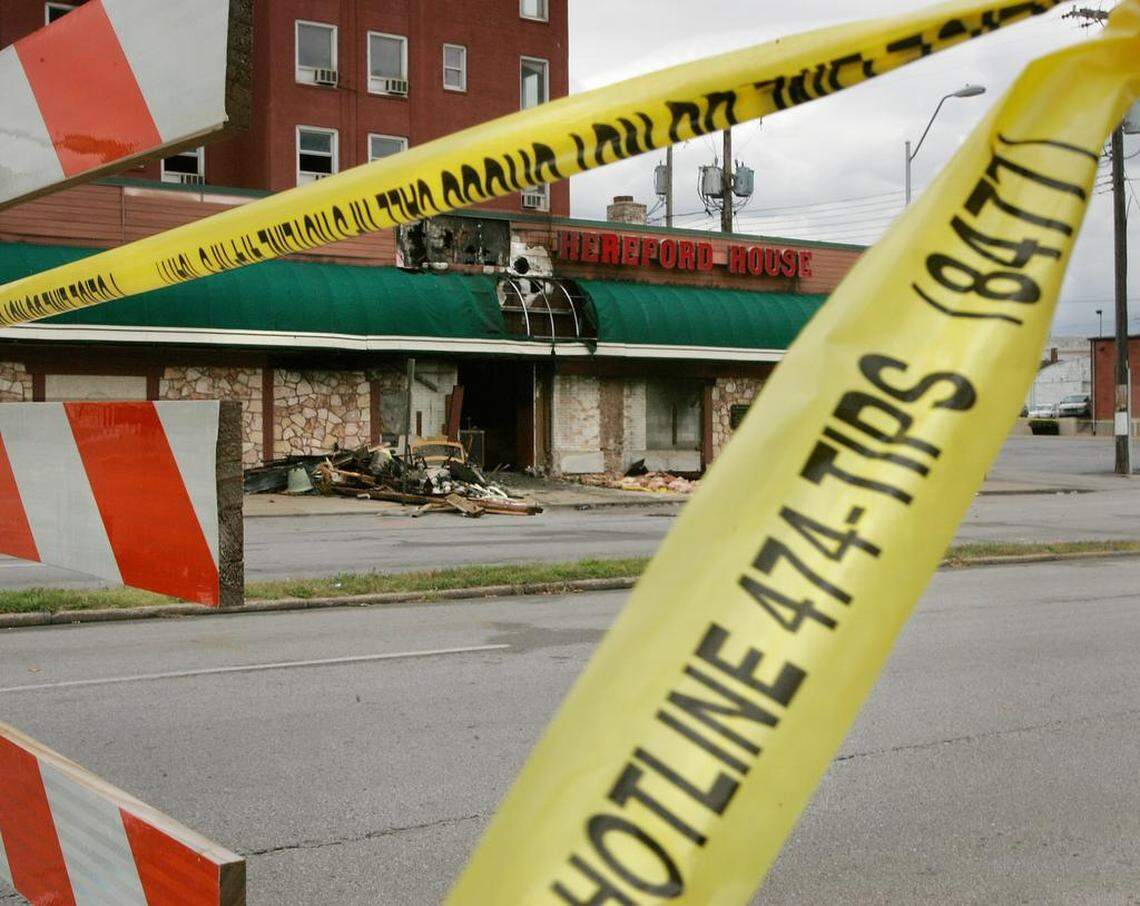 Crime scene tape barricaded the burned shell of the Hereford House restaurant after an October 2008 fire and explosion.