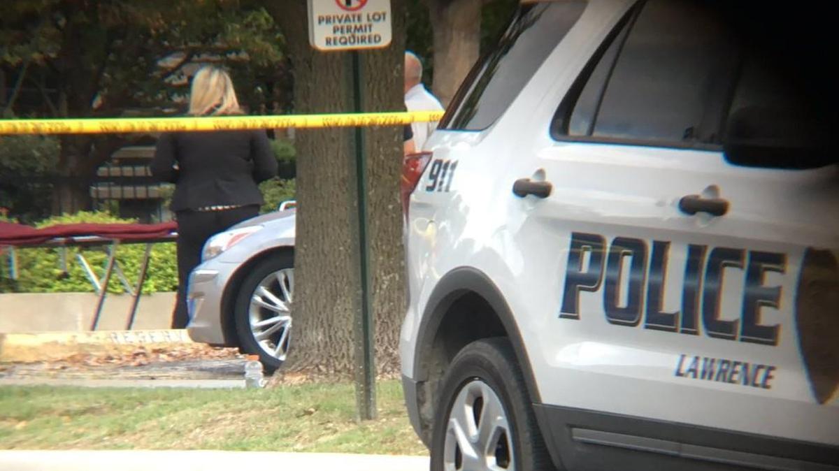 Police on Sunday morning investigated the scene of a shooting that killed three and injured two in downtown Lawrence.