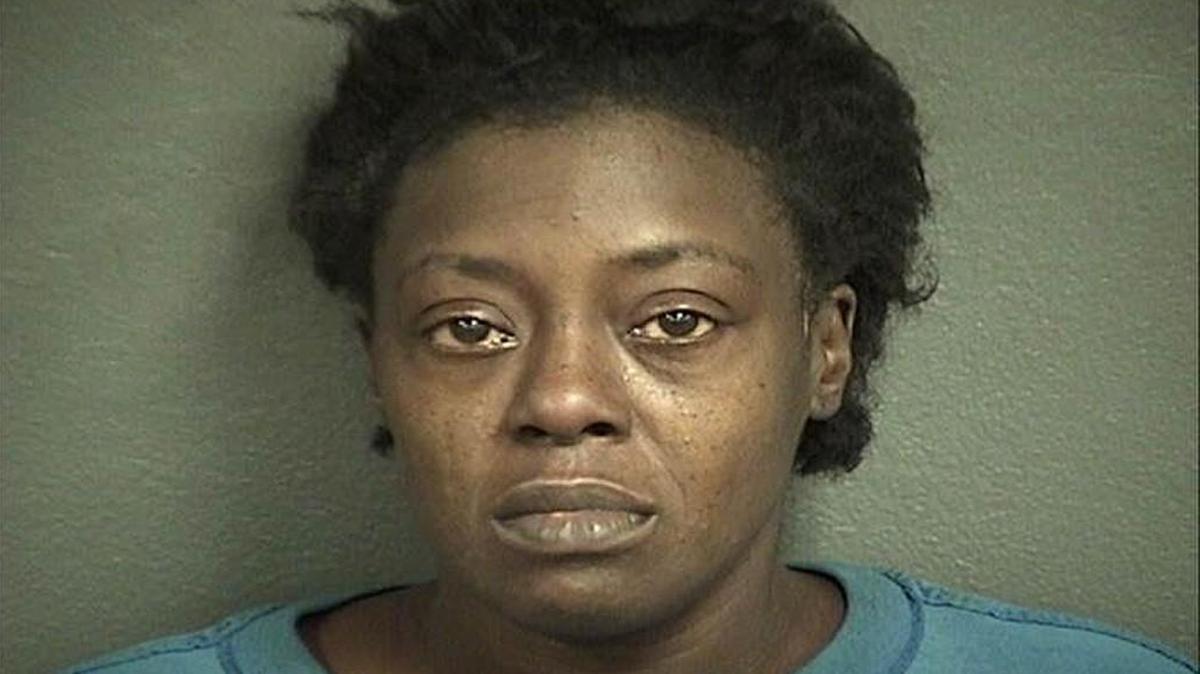 Tahmekah Henson, 40, is accused of setting fires at Kansas City, Kan., grocery stores as a distraction so she allegedly could escape with stolen food.