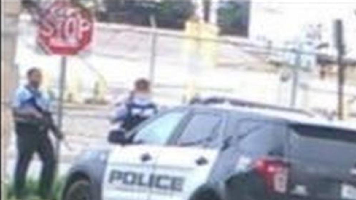 
The Kansas City, Kan., Police Department issued an apology Sunday after photographs showed two officers posing with rifles in front of a vandalized stop sign.
