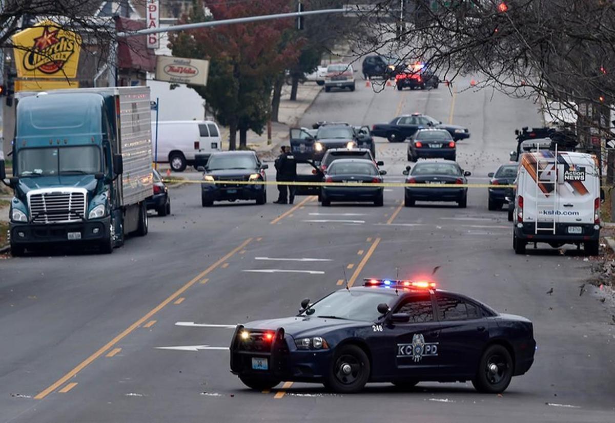 Kansas City police were still on the scene Sunday near Gregory Boulevard and Prospect Avenue after an early morning rolling gunbattle injured seven people.