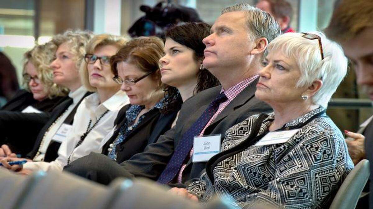 
St. Louis officials and civic leaders met with their Kansas City counterparts on Monday to learn how “focused deterrence” can reduce violent crime. Among those attending were John Bird (second from right) and Toni Decker (right), both with the U.S. attorney’s office for eastern Missouri.

