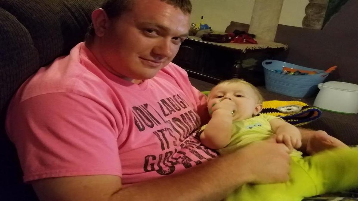 Ryan Rossiter holds his 9-month-old nephew in his lap in this picture taken in 2016. Rossiter was hit and killed by an SUV while walking in Gladstone on Dec. 9.