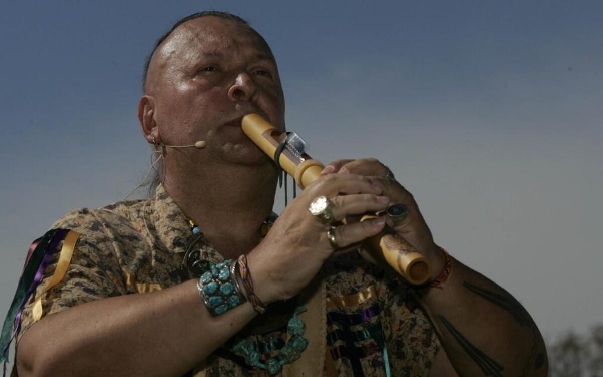 
Terry Lee Whetstone played his flute at the 2010 Kansas City Indian Art Market and Cultural Festival at the Line Creek Community Center. 
