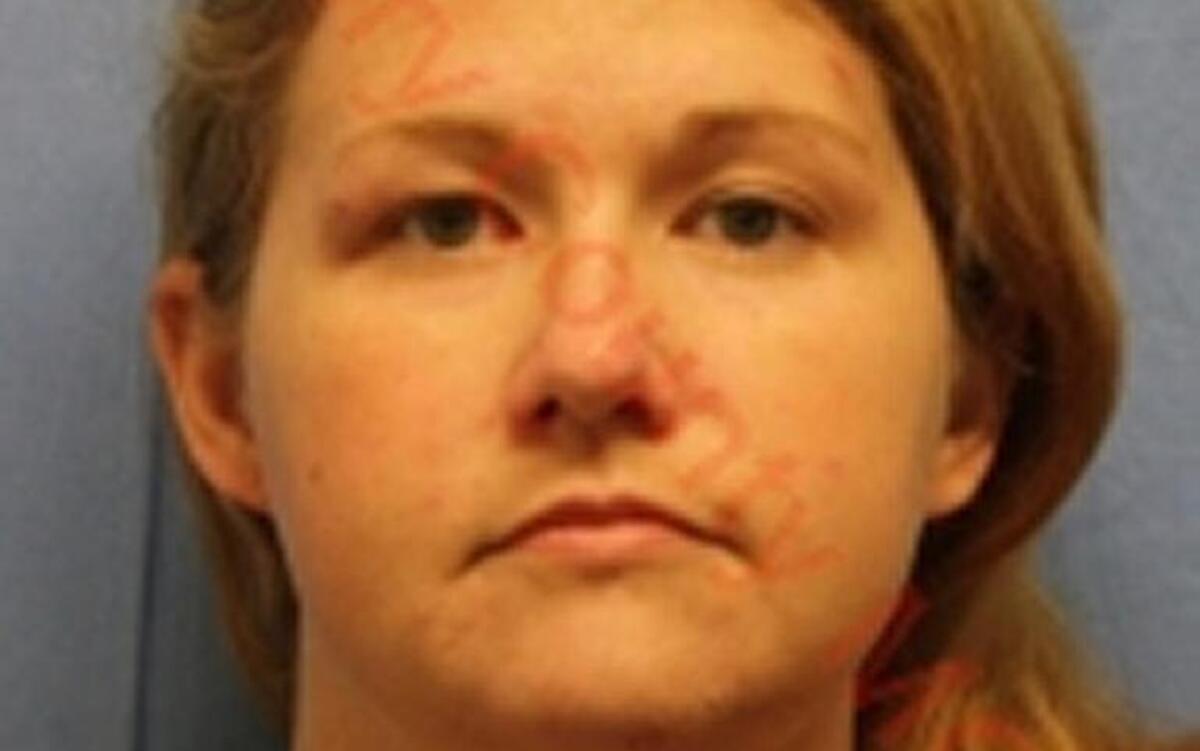 Brandie Noble was charged Thursday with one count of hindering prosecution and four counts of endangering the welfare of a child in the shooting death of Clinton, Mo., Police Officer Gary Michael.