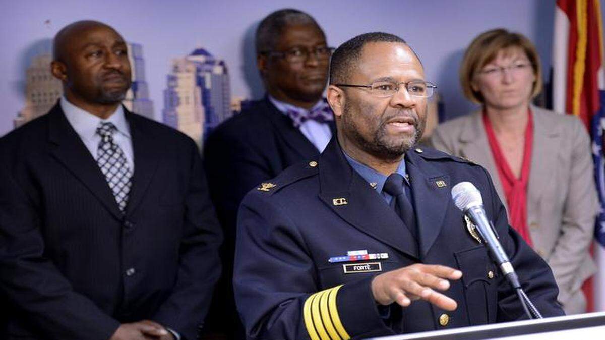 
Kansas City Police Chief Darryl Forté uses social media to update the public about developments such as when police arrested a suspect in a series of highway shootings that wounded three and terrorized countless motorists. Behind Forte are Mayor Sly James and prosecuting attorney Jean Peters.
