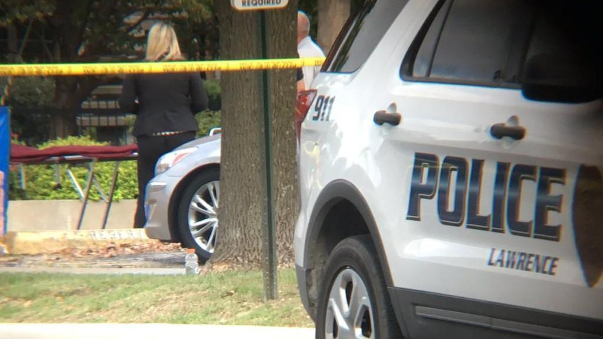 Police investigate a shooting that killed three and injured two in downtown Lawrence.