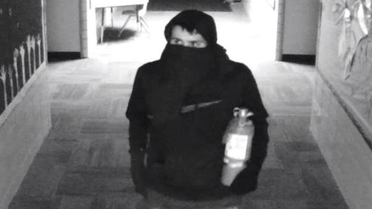 Overland Park police say this man burglarized Santa Fe Trail Elementary School early Wednesday.