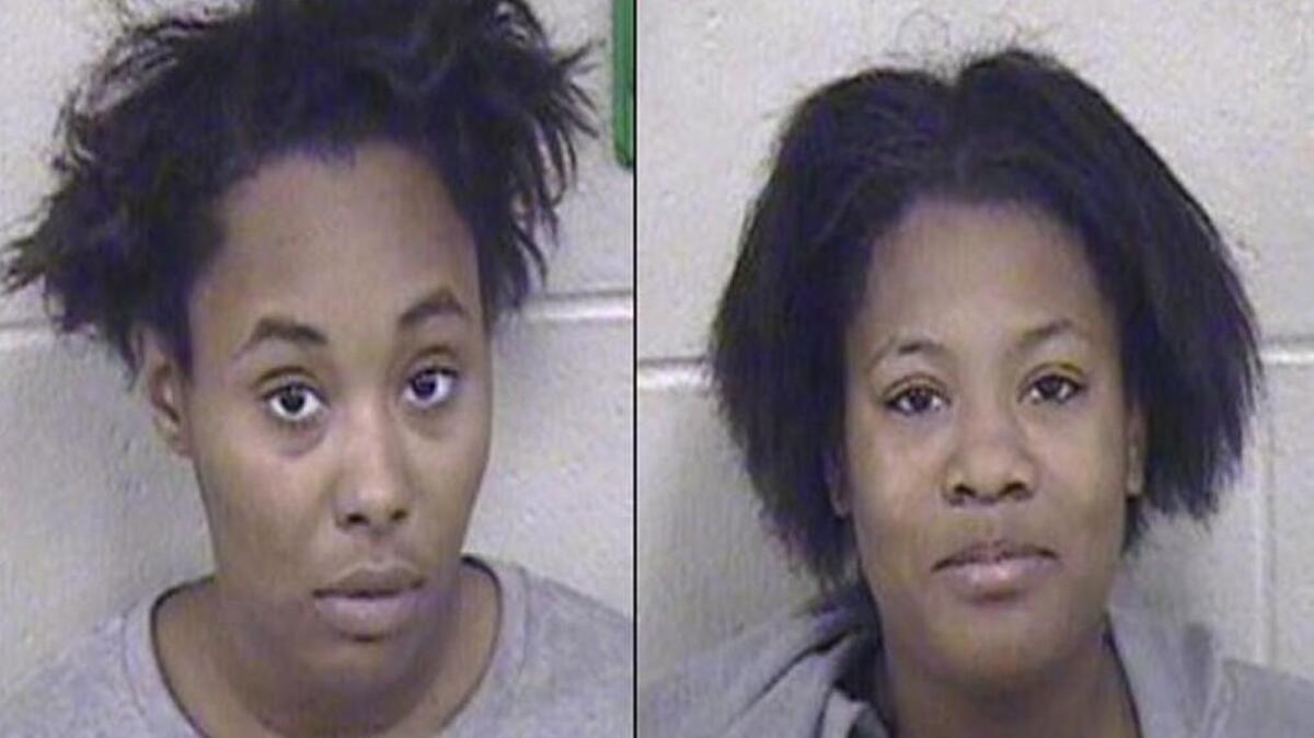 Tijazala McGrone (right) and Princess Kingyon are charged with robbery and attempted robbery in incidents in which they allegedly used pepper spray to attempt to incapacitate victims. A third woman, Jaquevion Graham-Nelson, is also charged. A photo of her was not immediately available.