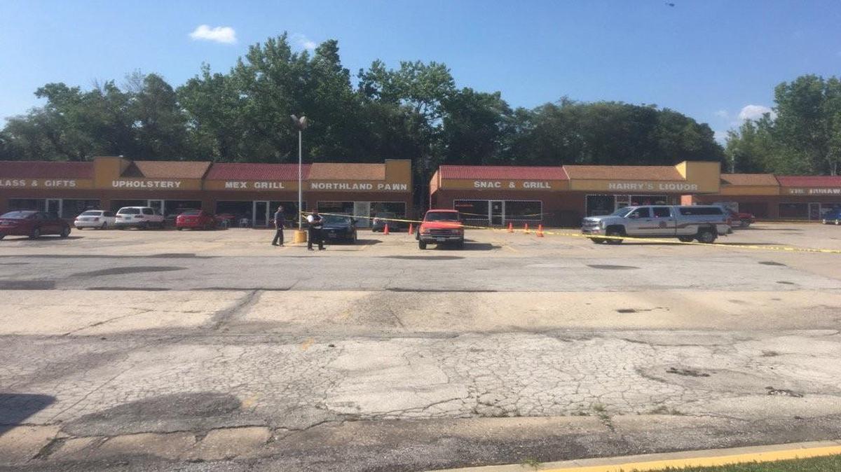 Police tape was put up Monday in a Northmoor/Riverside strip mall while police searched for a fleeing suspect whom the Northmoor police chief shot after the man took off in his patrol car.
