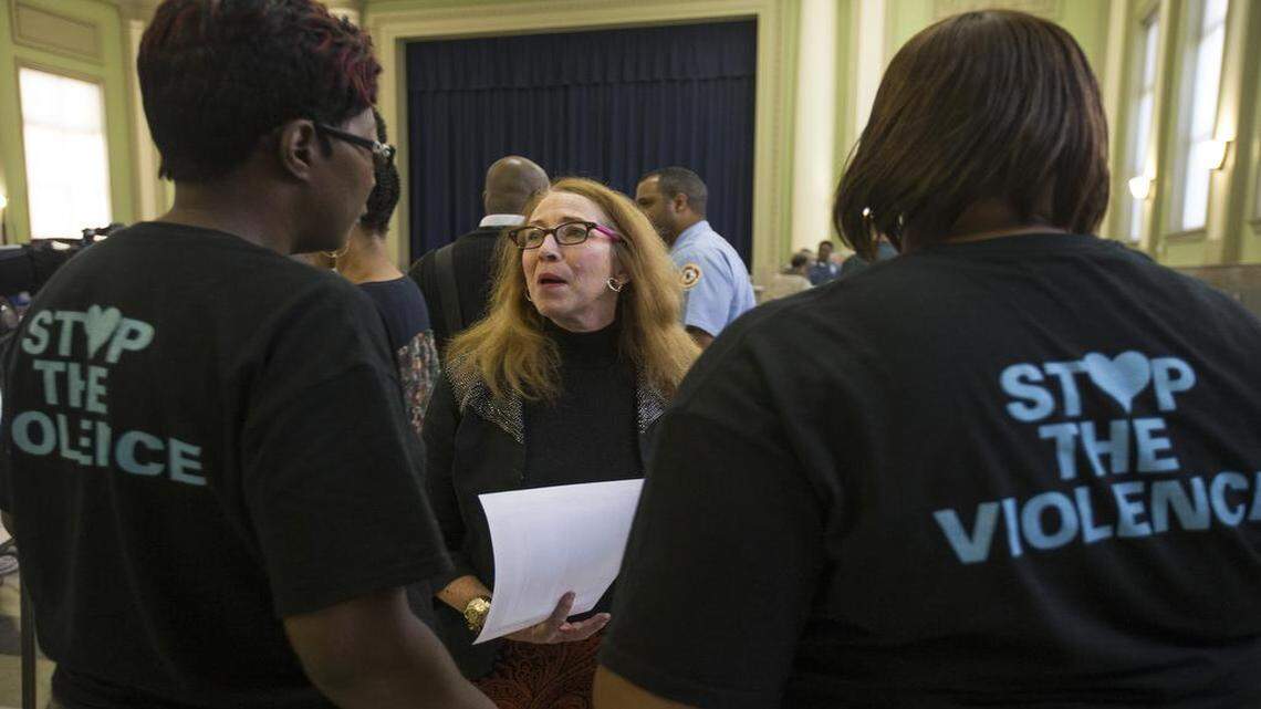 
Leslie Abbey (center) of Inspired Minds Kansas City greeted Lenora Williams (left) and Latrice Murray from the group Mothers in Charge at the Kansas City No Violence Alliance rally Saturday at the Robert Mohart Multipurpose Focus Center.
