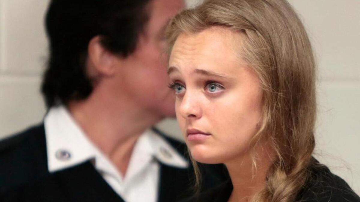 
In this Aug. 24 photo, Michelle Carter listened to defense attorney Joseph P. Cataldo argue for an involuntary manslaughter charge against her to be dismissed at Juvenile Court in New Bedford, Mass. 

