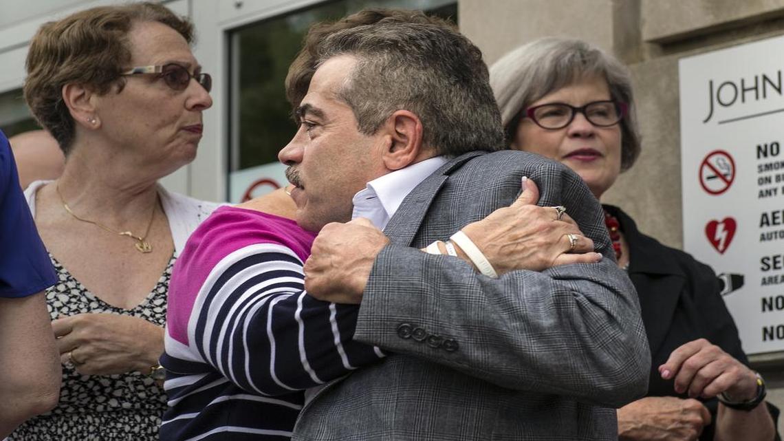 
Melinda Corporon (left) hugs Jim LaManno on Tuesday, Sept. 8, 2015,on the steps outside the Johnson County Courthouse in Olathe. A Johnson County jury decided F. Glenn Miller Jr. should be put to death for the shotgun slaying of three people outside Jewish facilities in Overland Park in April 2014. Jurors a little more than a week ago found Miller guilty of capital murder in the deaths of William Corporon, 69, his 14-year-old grandson, Reat Underwood, and Terri LaManno, 53. Corporon was Reat Underwood's grandmother and William Corporon's wife and LaManno was Terri LaManno's husband.
