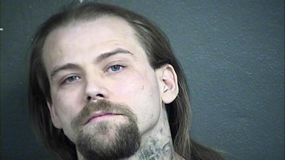 Jeremy Comstock, 28, was charged in Wyandotte County with first-degree murder and three counts of kidnapping.