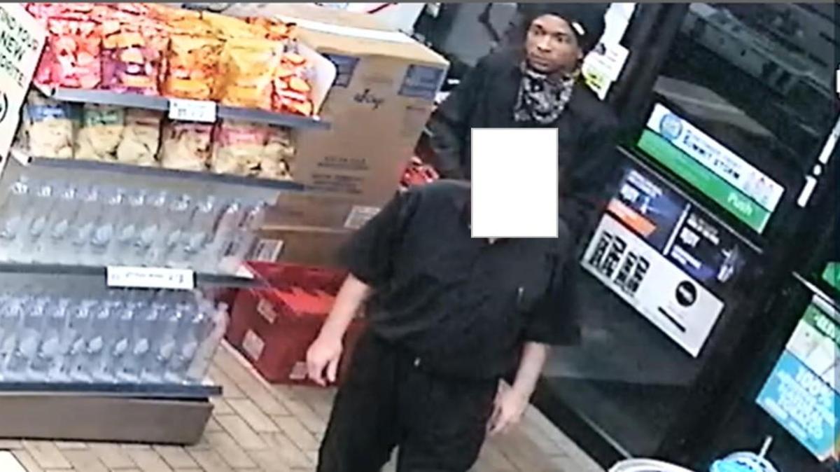 Olathe police have released digitally enhanced photos of a suspect wanted in connection with an aggravated robbery in August.