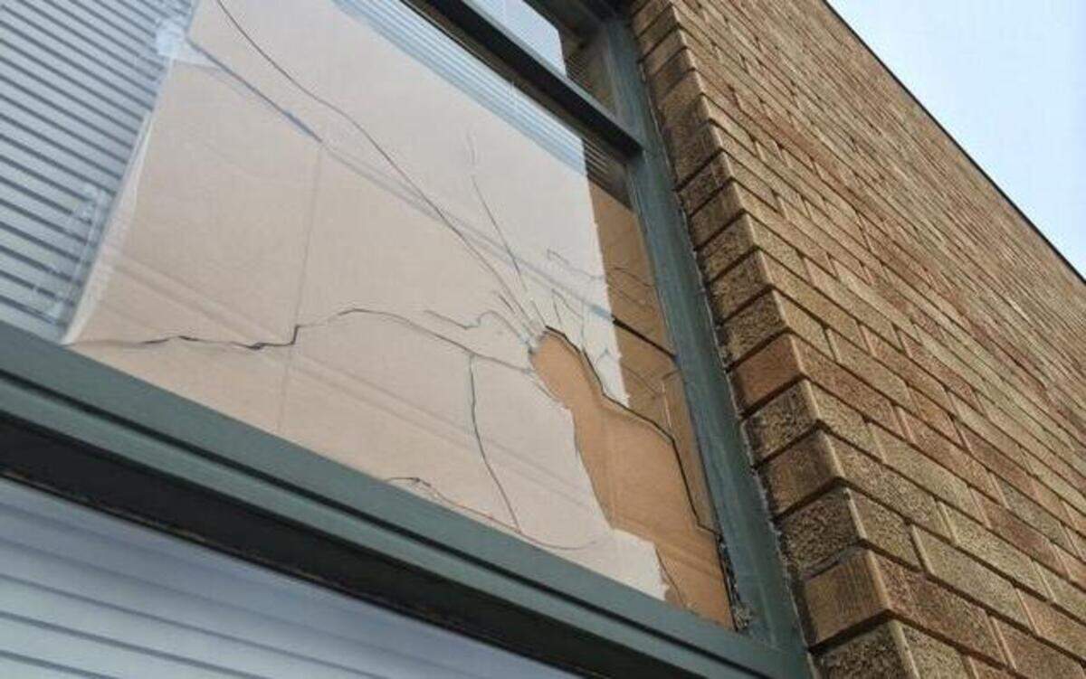 
On Sept. 11, someone attempted a firebombing of Rep. Emanuel Cleaver’s office at 101 W. 31st St., leaving this broken window. Below the window, broken bottles with paper towels were found.
